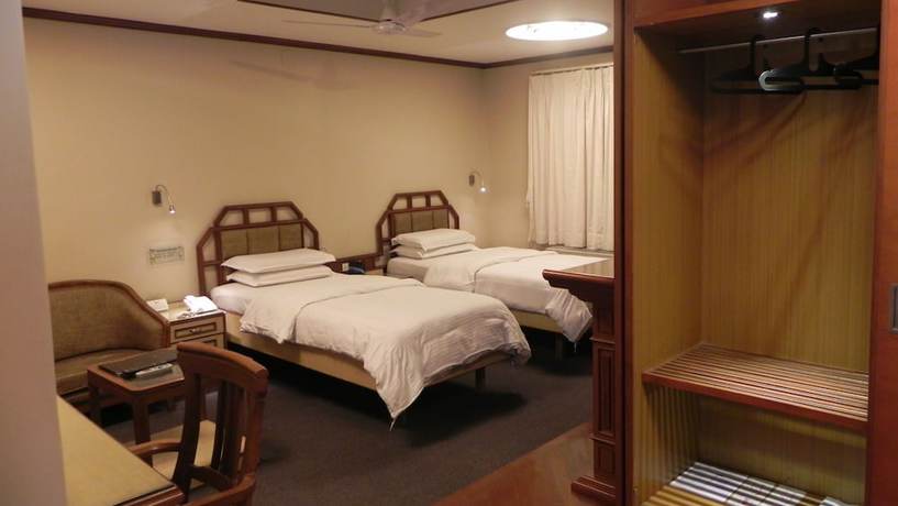 Imagen de la habitación del Hotel Aram, Jamnagar. Foto 11