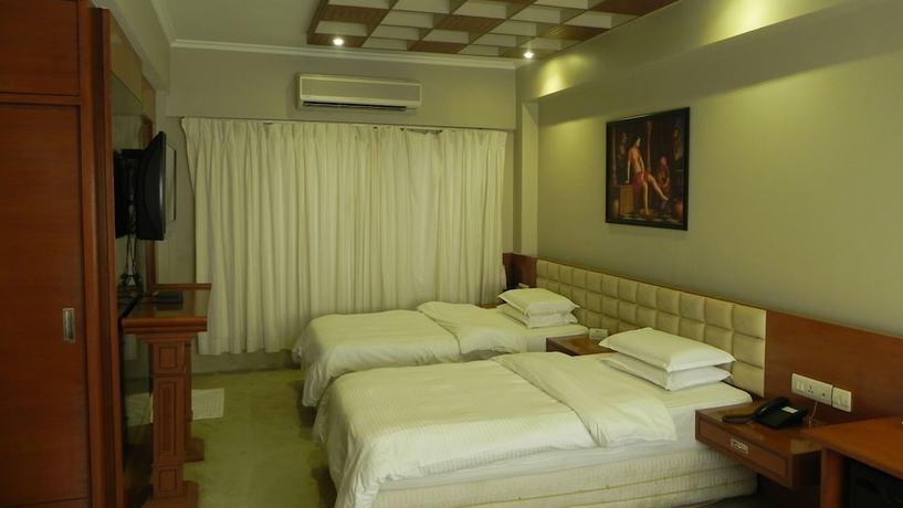 Imagen de la habitación del Hotel Aram, Jamnagar. Foto 12
