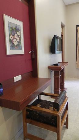 Imagen de la habitación del Hotel Aram, Jamnagar. Foto 13