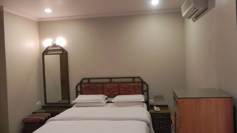 Imagen de la habitación del Hotel Aram, Jamnagar. Foto 15