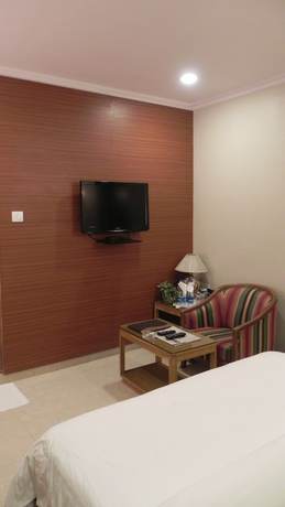 Imagen de la habitación del Hotel Aram, Jamnagar. Foto 18