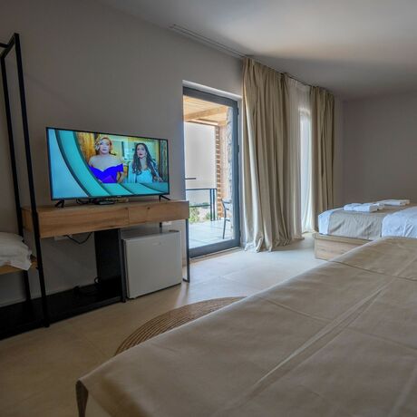 Imagen de la habitación del Hotel Arameras Beach Resort. Foto 18