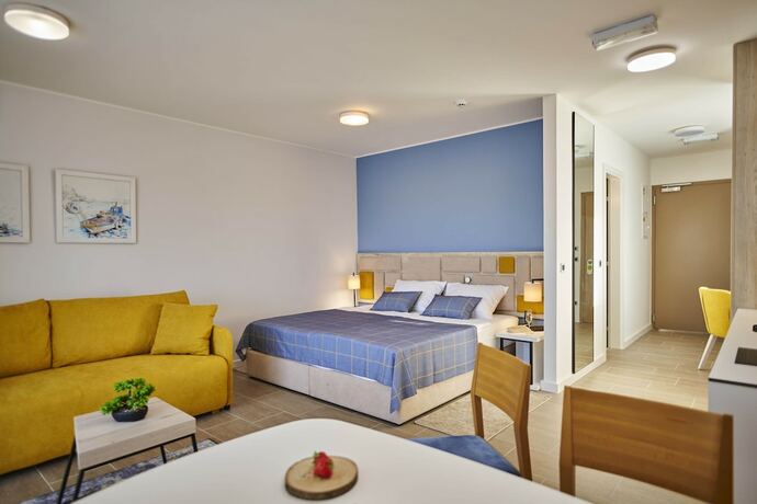 Imagen de la habitación del Hotel Arancini Residence. Foto 12