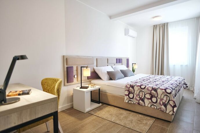 Imagen de la habitación del Hotel Arancini Residence. Foto 17