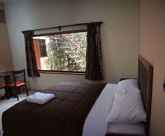 Imagen de la habitación del Hotel Arantza Suites. Foto 16