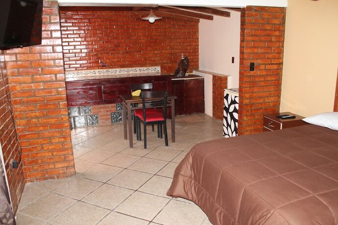 Imagen de la habitación del Hotel Arantza Suites. Foto 17