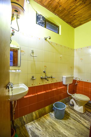 Imagen de la habitación del Hotel Aranya Jungle Resort. Foto 4