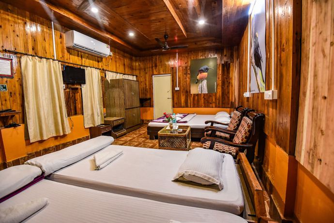 Imagen de la habitación del Hotel Aranya Jungle Resort. Foto 16