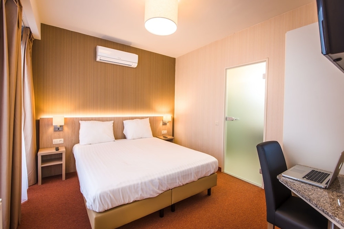 Imagen de la habitación del Hotel Arass Business Flats. Foto 9