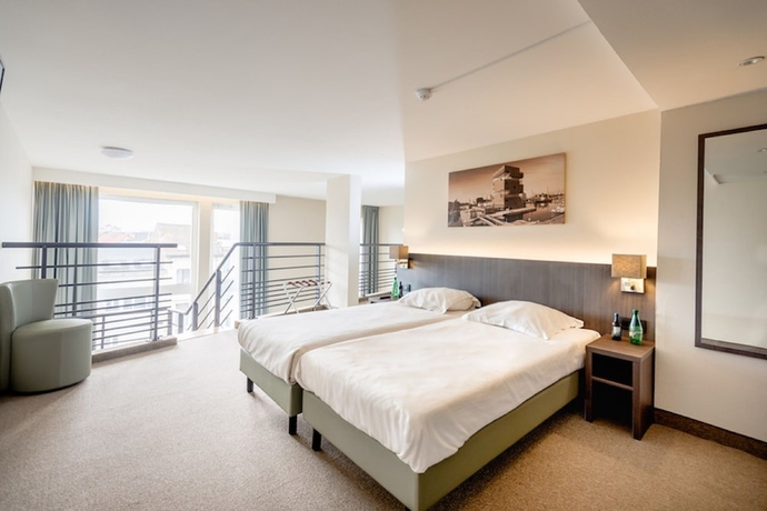 Imagen de la habitación del Hotel Arass Business Flats. Foto 13