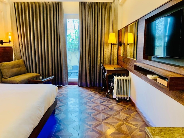 Imagen de la habitación del Hotel Aravali Resorts. Foto 11