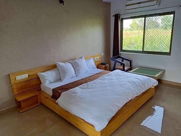 Imagen de la habitación del Hotel Aravalli Hill Resort. Foto 17