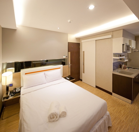 Imagen de la habitación del Hotel Arawana Express Phromphong. Foto 8