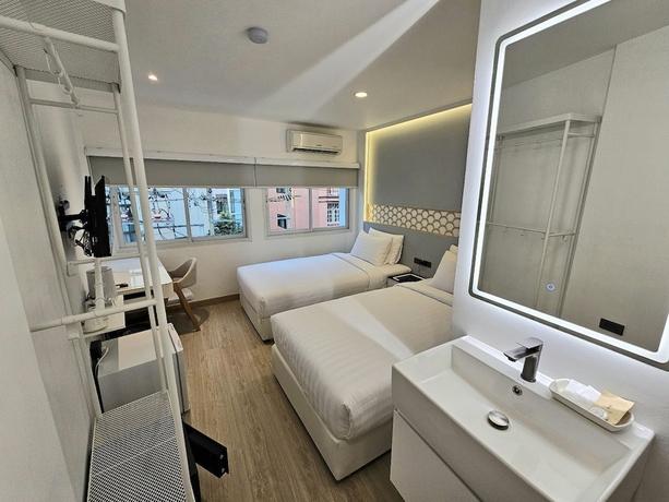 Imagen de la habitación del Hotel Arawana Express Sukhumvit 22. Foto 15