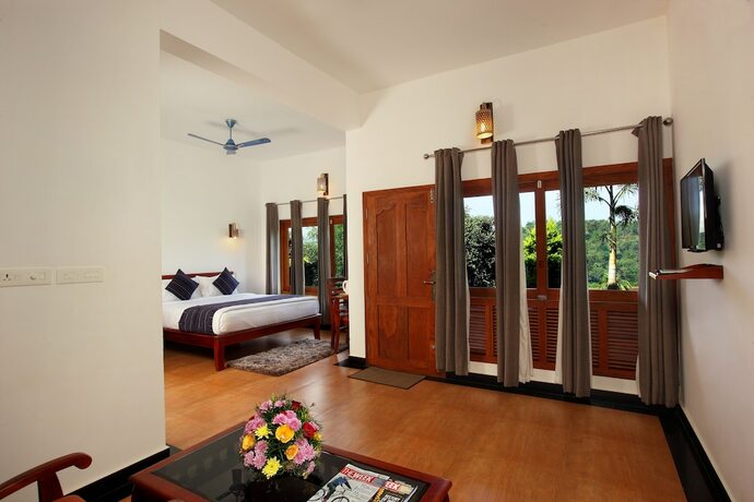 Imagen de la habitación del Hotel Arayal Resorts: A Unit of Sharoy Resort, Wayanad. Foto 16