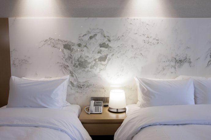 Imagen de la habitación del Hotel Arban. Foto 15