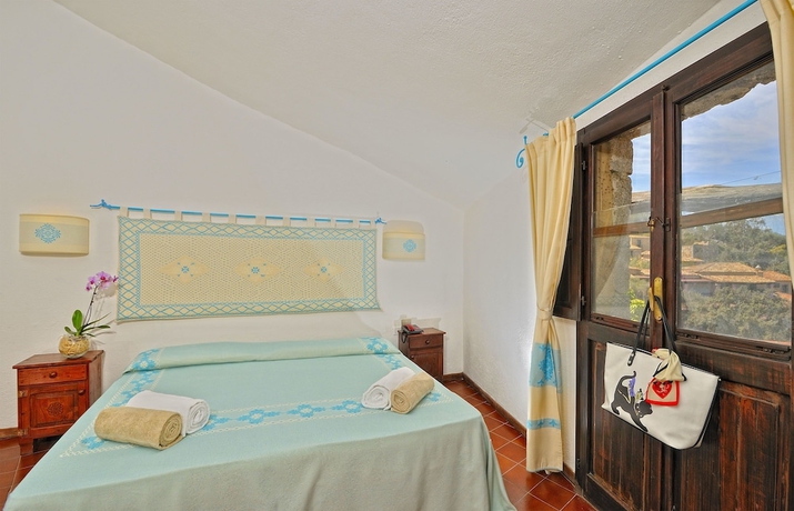 Imagen de la habitación del Hotel Arbatax Park Resort - Borgo Cala Moresca. Foto 10