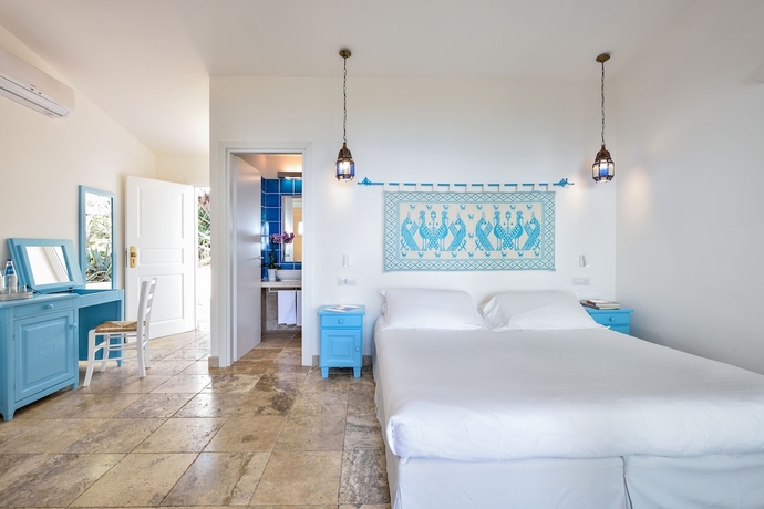 Imagen de la habitación del Hotel Arbatax Park Resort - Cottage. Foto 5