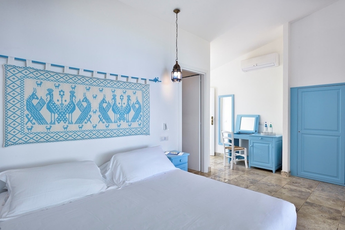 Imagen de la habitación del Hotel Arbatax Park Resort - Cottage. Foto 12