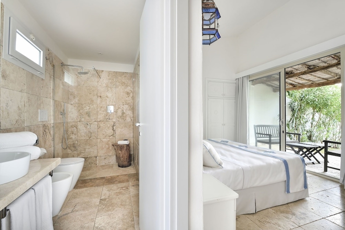 Imagen de la habitación del Hotel Arbatax Park Resort - Cottage. Foto 14