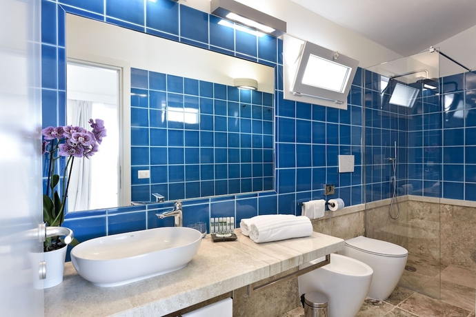 Imagen de la habitación del Hotel Arbatax Park Resort - Cottage. Foto 17