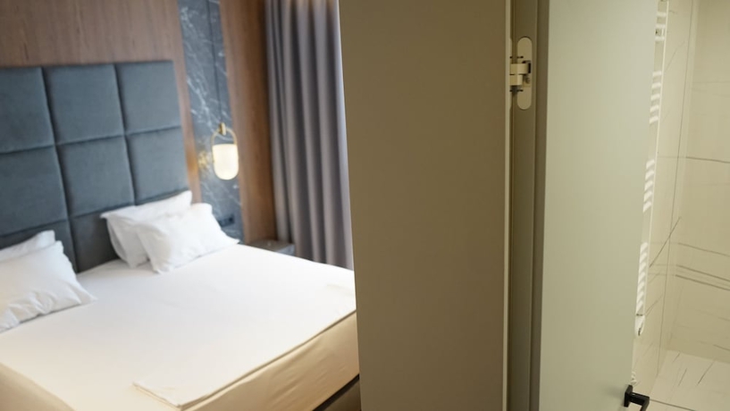 Imagen de la habitación del Hotel Arbnor Boutique. Foto 8