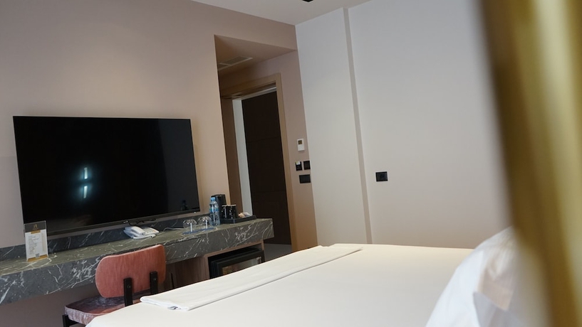 Imagen de la habitación del Hotel Arbnor Boutique. Foto 9
