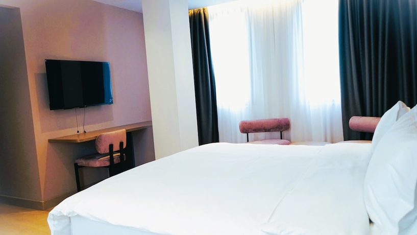 Imagen de la habitación del Hotel Arbnor Boutique. Foto 10