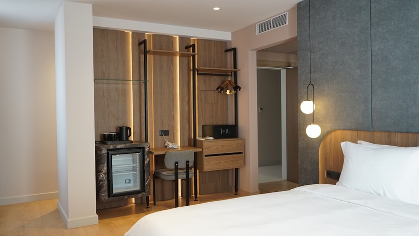 Imagen de la habitación del Hotel Arbnor Boutique. Foto 13