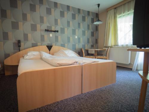 Imagen de la habitación del Hotel Arbor&eacute;tum, Hark&aacute;ny. Foto 8