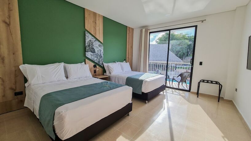 Imagen de la habitación del Hotel Arboreo Doradal. Foto 15