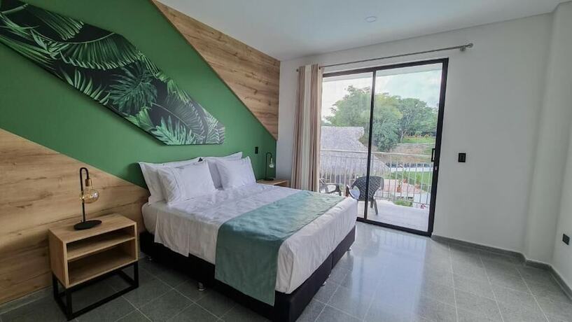 Imagen de la habitación del Hotel Arboreo Doradal. Foto 18