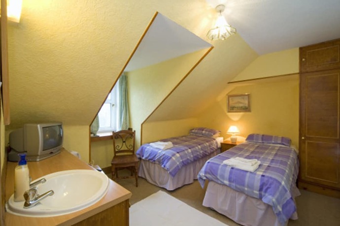 Imagen de la habitación del Hotel Arbour Guest House. Foto 10