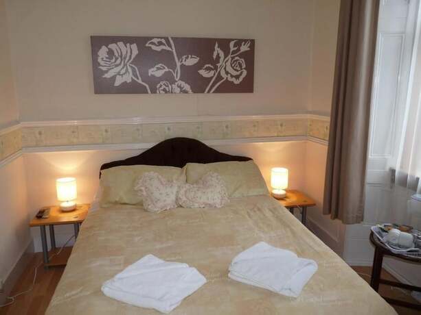 Imagen de la habitación del Hotel Arbour Guest House. Foto 11