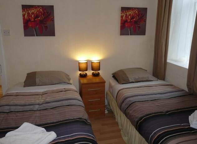 Imagen de la habitación del Hotel Arbour Guest House. Foto 13