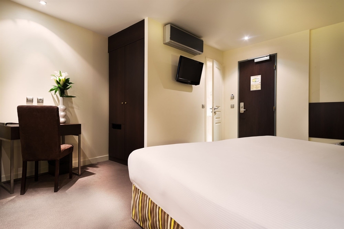 Imagen de la habitación del Hotel Arc De Triomphe, París. Foto 5