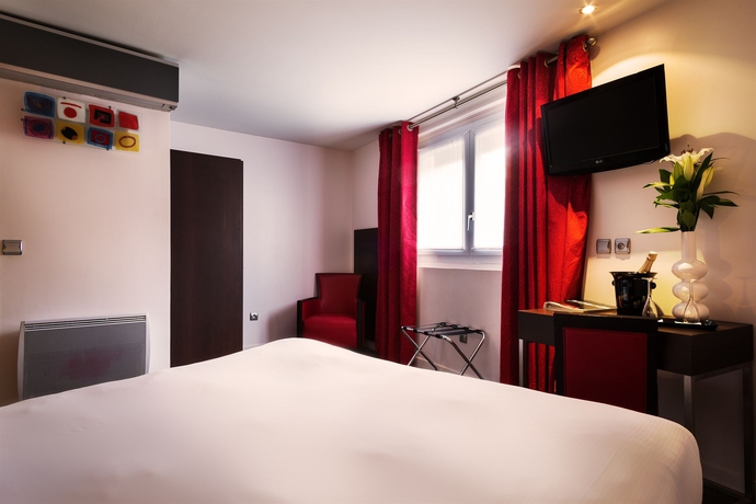 Imagen de la habitación del Hotel Arc De Triomphe, París. Foto 6