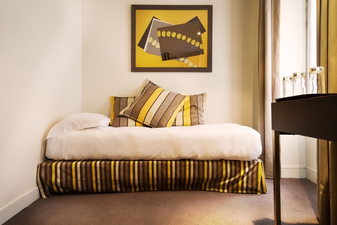 Imagen de la habitación del Hotel Arc De Triomphe, París. Foto 7