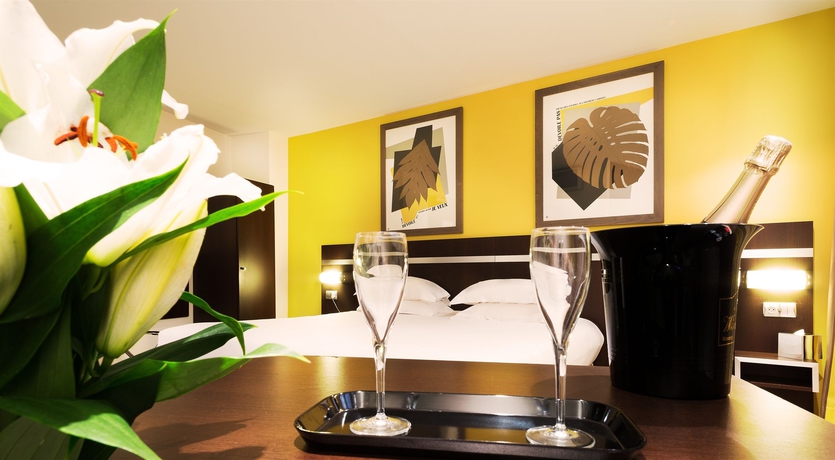 Imagen de la habitación del Hotel Arc De Triomphe, París. Foto 10