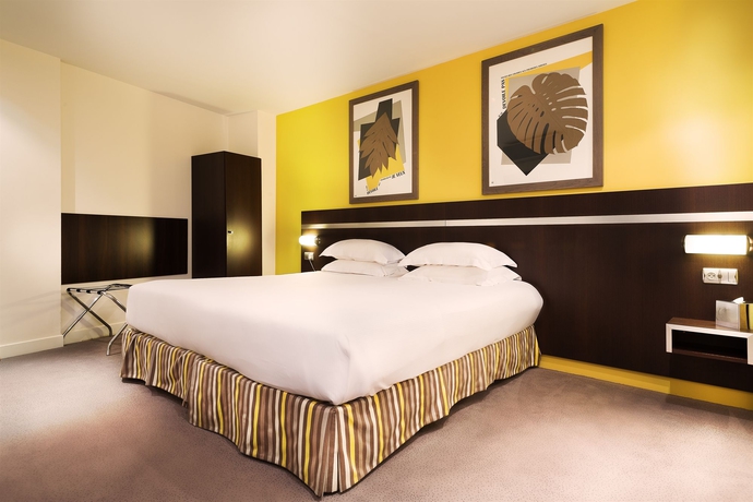 Imagen de la habitación del Hotel Arc De Triomphe, París. Foto 11