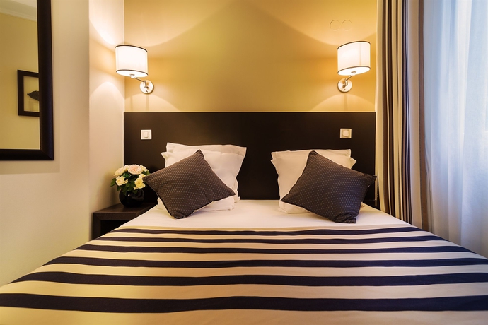 Imagen de la habitación del Hotel Arc Elysees. Foto 6