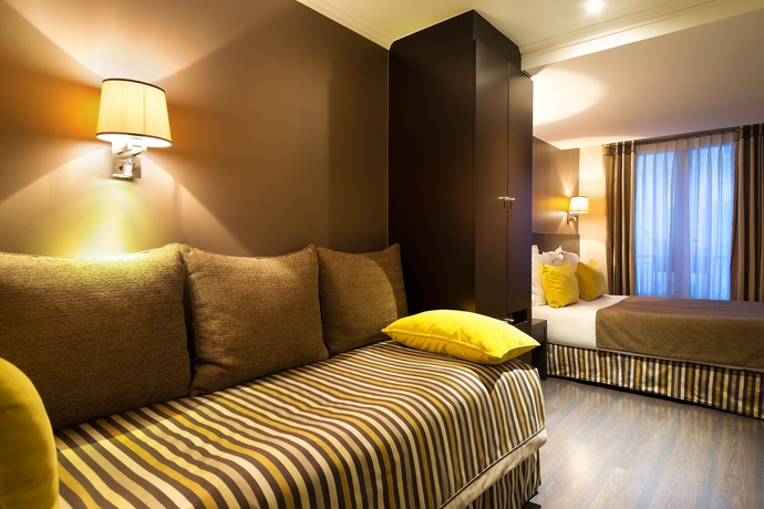 Imagen de la habitación del Hotel Arc Elysees. Foto 10