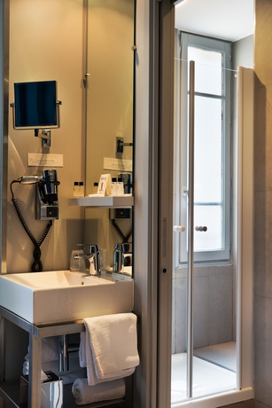 Imagen de la habitación del Hotel Arc de Triomphe Etoile. Foto 8