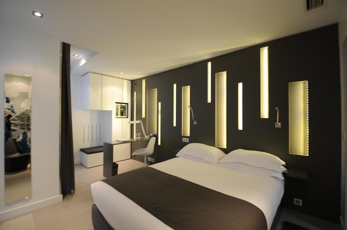 Imagen de la habitación del Hotel Arc de Triomphe Etoile. Foto 9