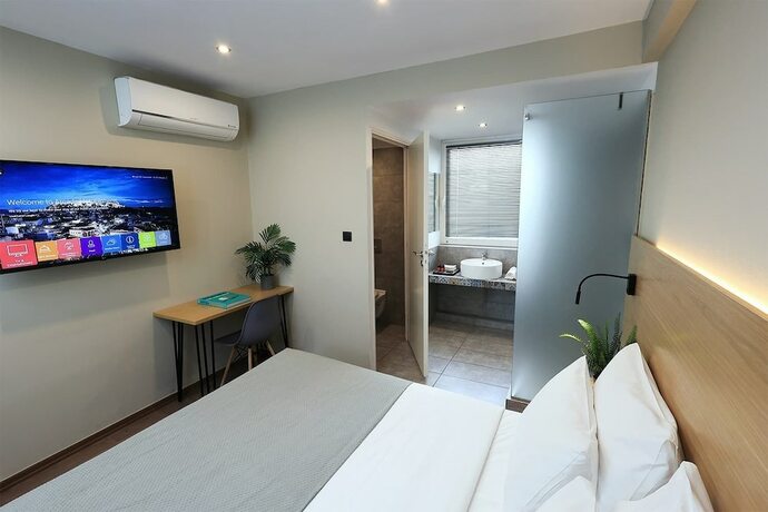 Imagen de la habitación del Hotel Arcade, Atenas. Foto 15