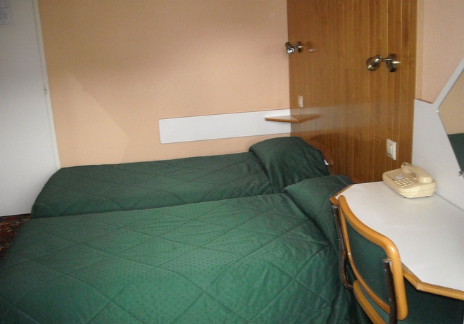 Imagen de la habitación del Hotel Arcades. Foto 7