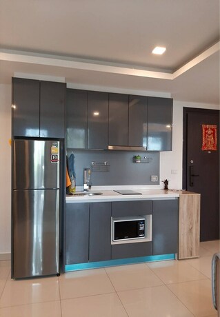 Imagen de la habitación del Hotel Arcadia Beach Condo By Jiabo. Foto 18