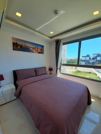 Imagen de la habitación del Hotel Arcadia Beach Condo By Jiabo. Foto 22