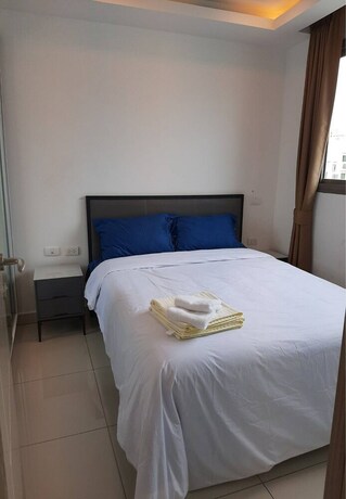 Imagen de la habitación del Hotel Arcadia Beach Condo By Jiabo. Foto 25