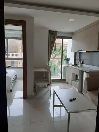 Imagen de la habitación del Hotel Arcadia Beach Condo By Jiabo. Foto 29